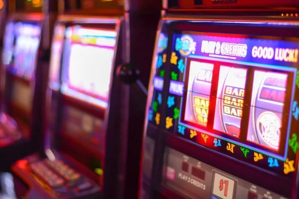 Dealer revealing cards in live Baccarat round